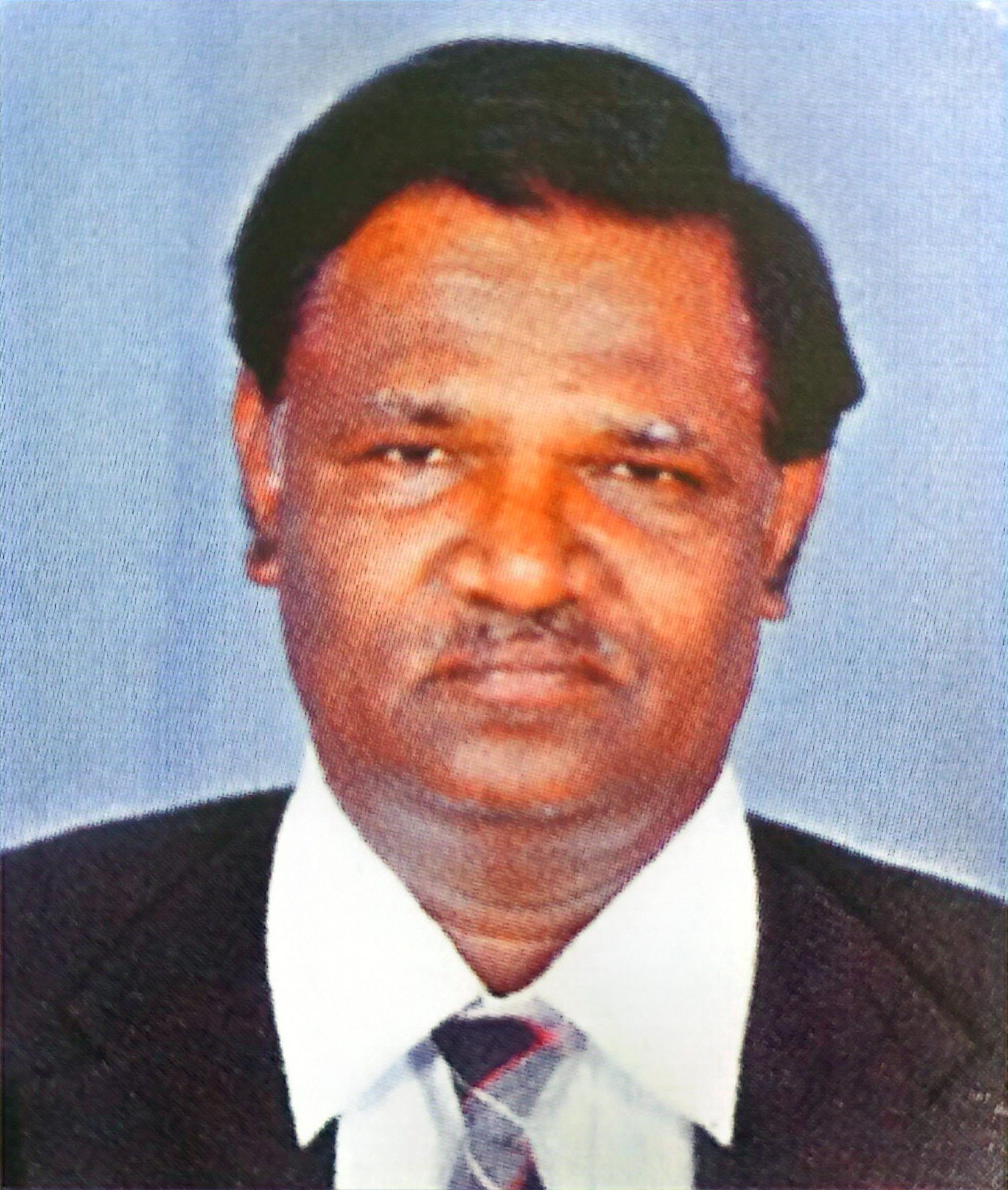 Dr. S.T. Naidu