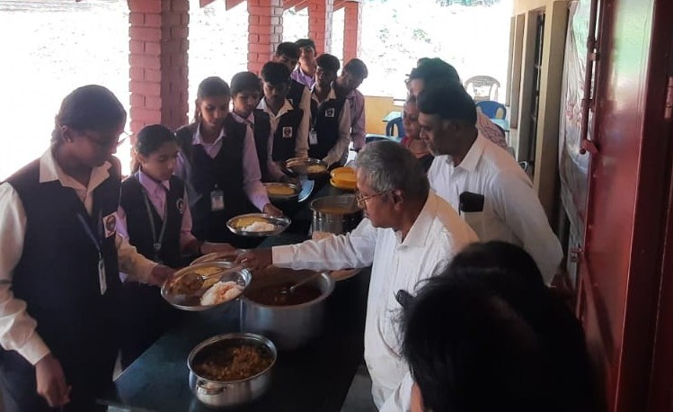 Students receiving lunch at the college midday meal programme